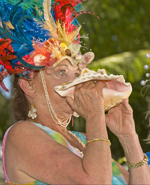 Blowing into the conchs' fluted pink-lined shells is a Key West tradition, with "conch horns."